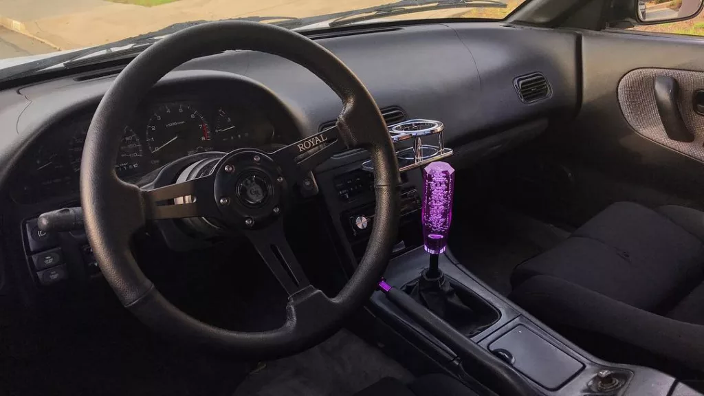 S13 with an aftermarket steering wheel